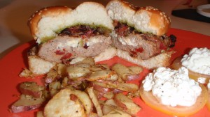 Feta Cheese Stuffed Roasted Red Pepper and Rosemary Turkey Burgers with Crispy Proscuitto and Pesto Toppings with Rosemary Roasted Potatoes