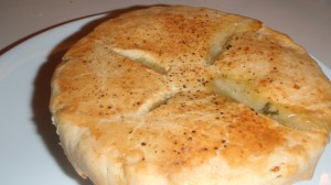 Chicken Pot Pie, Chicken, peas, carrots, celery and delicious gravy (snatch that gravy up!) baked inside of a buttery crispy crust. YUM!